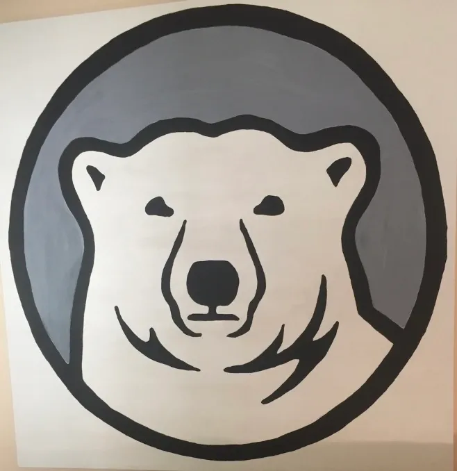 A polar bear is painted on the wall.