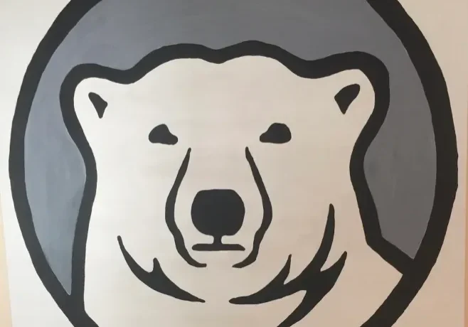 A polar bear is painted on the wall.